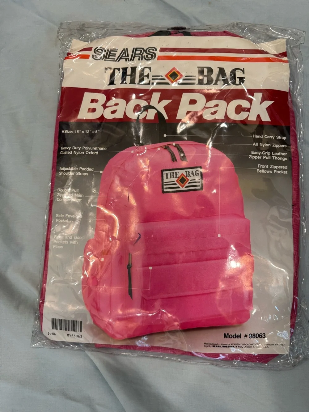 Vintage 1980s Sears “The Bag” backpack in bright pink, Model #98063.